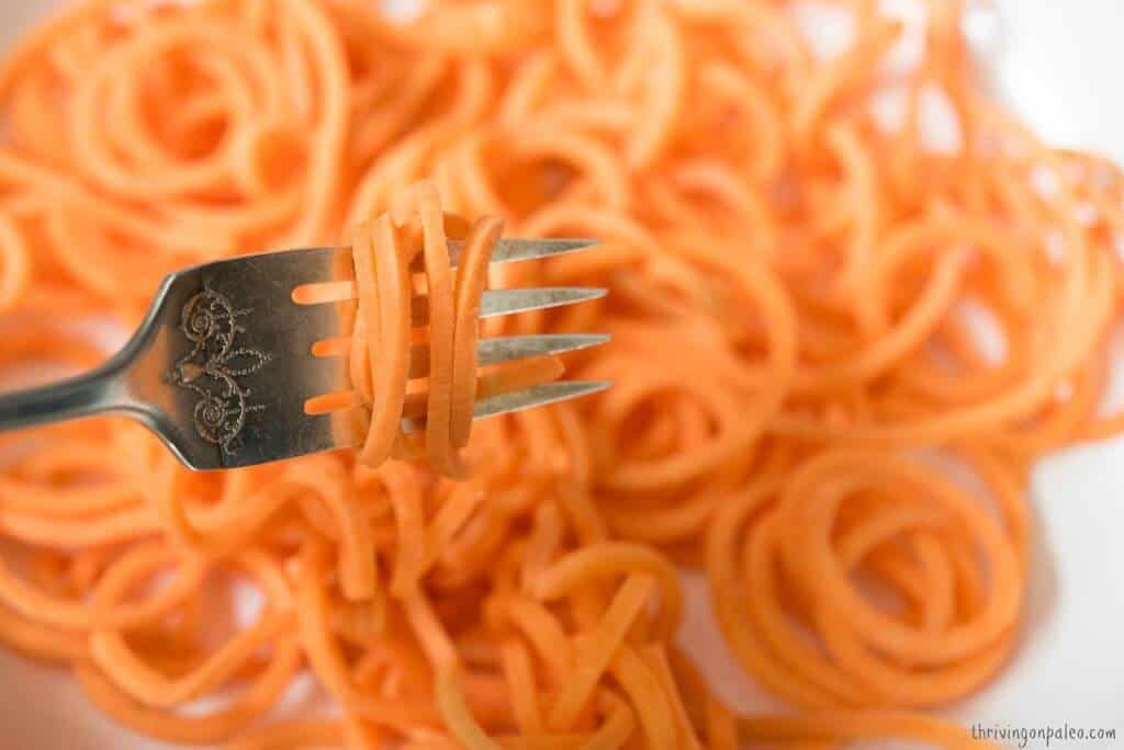 Sweet Potato Noodles recipe and video tutorial by Thriving On Paleo. A Paleo, gluten-free, vegetarian, and vegan side dish.