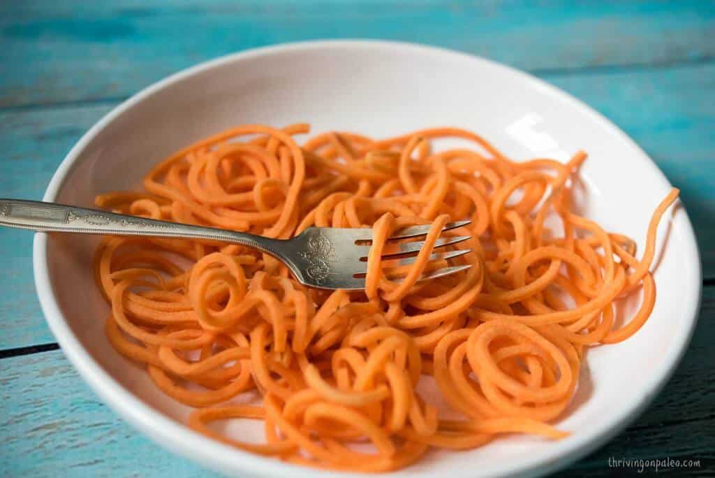 Sweet Potato Noodles recipe and video tutorial by Thriving On Paleo. A Paleo, gluten-free, vegetarian, and vegan side dish.