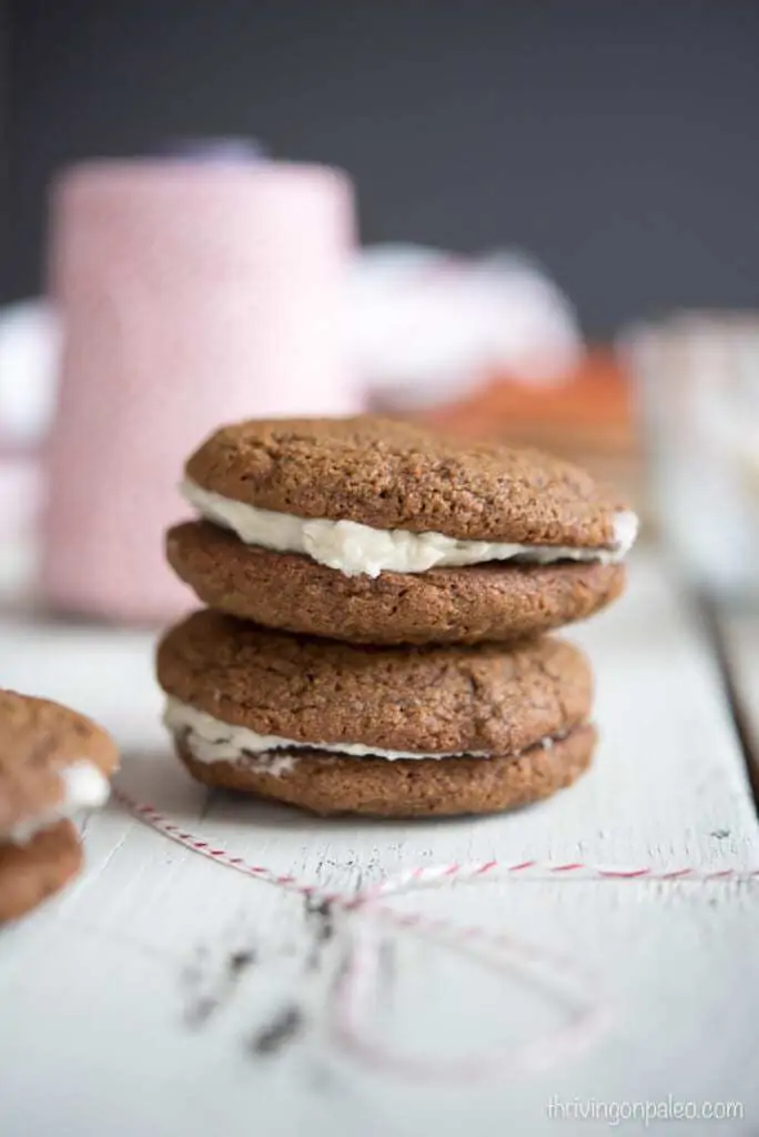 Paleo Molasses Cookies with Maple Cream Filling - a gluten-free and dairy-free cookie recipe that is perfect for Christmas and the holidays!