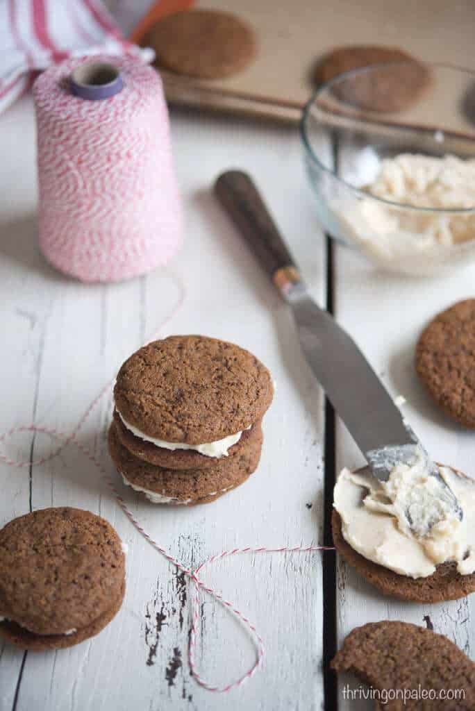 Paleo Molasses Cookies with Maple Cream Filling - a gluten-free and dairy-free cookie recipe that is perfect for Christmas and the holidays!