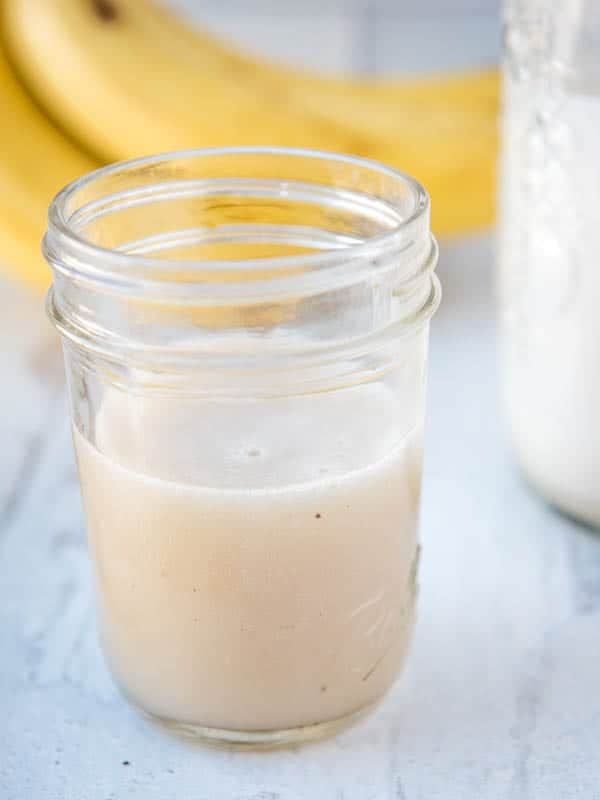 AIP coconut milk substitute banana milk in a glass