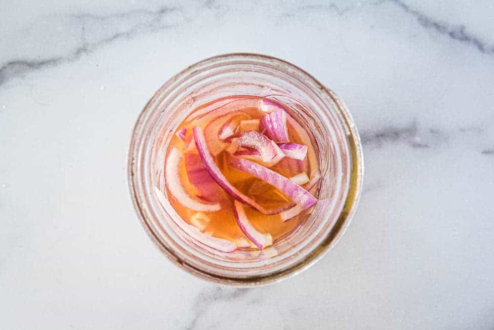 the red onions in the vinegar solution for pickling
