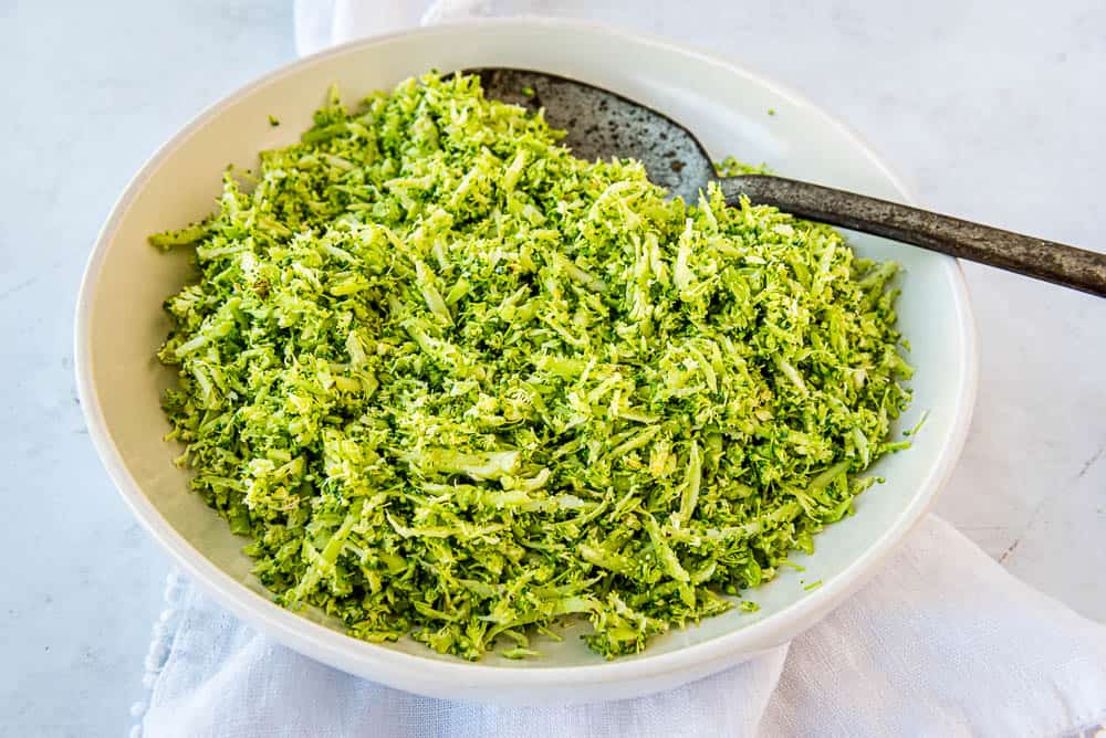 Broccoli Rice in a white bowl from the side