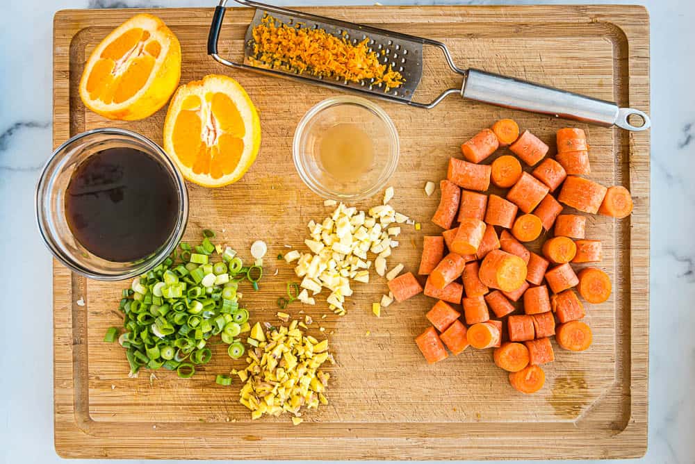 ingredients for orange ginger beef on a cutting board